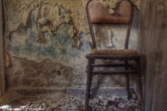 A Chair where the baker of an abandoned Greek bakery used to have lunch -1