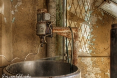 An antique dough mixer in an abandoned Greek bakery