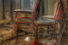 Chairs collecting dust in an abandoned Greek bakery-1