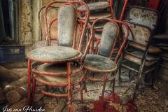 Chairs collecting dust in an abandoned Greek bakery-3